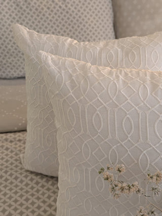 White on white embroidered cushion covers