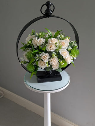 Graceful Blooms in Iron Frame