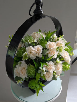 Graceful Blooms in Iron Frame