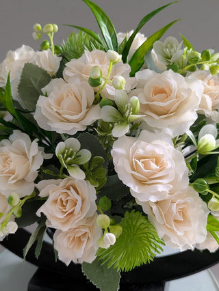 Graceful Blooms in Iron Frame