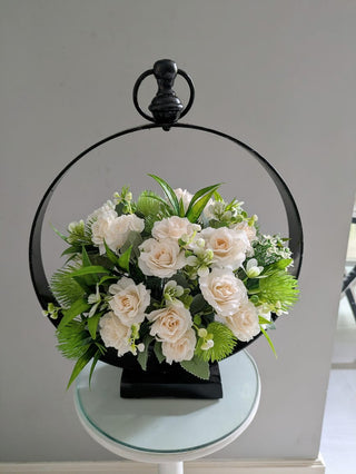 Graceful Blooms in Iron Frame
